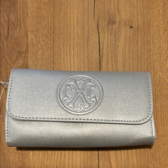Christian Lacroix Handbags - NWT CXL by Christian Lacroix Silver Park Smooth Small Clutch Wristlet Reg. $78